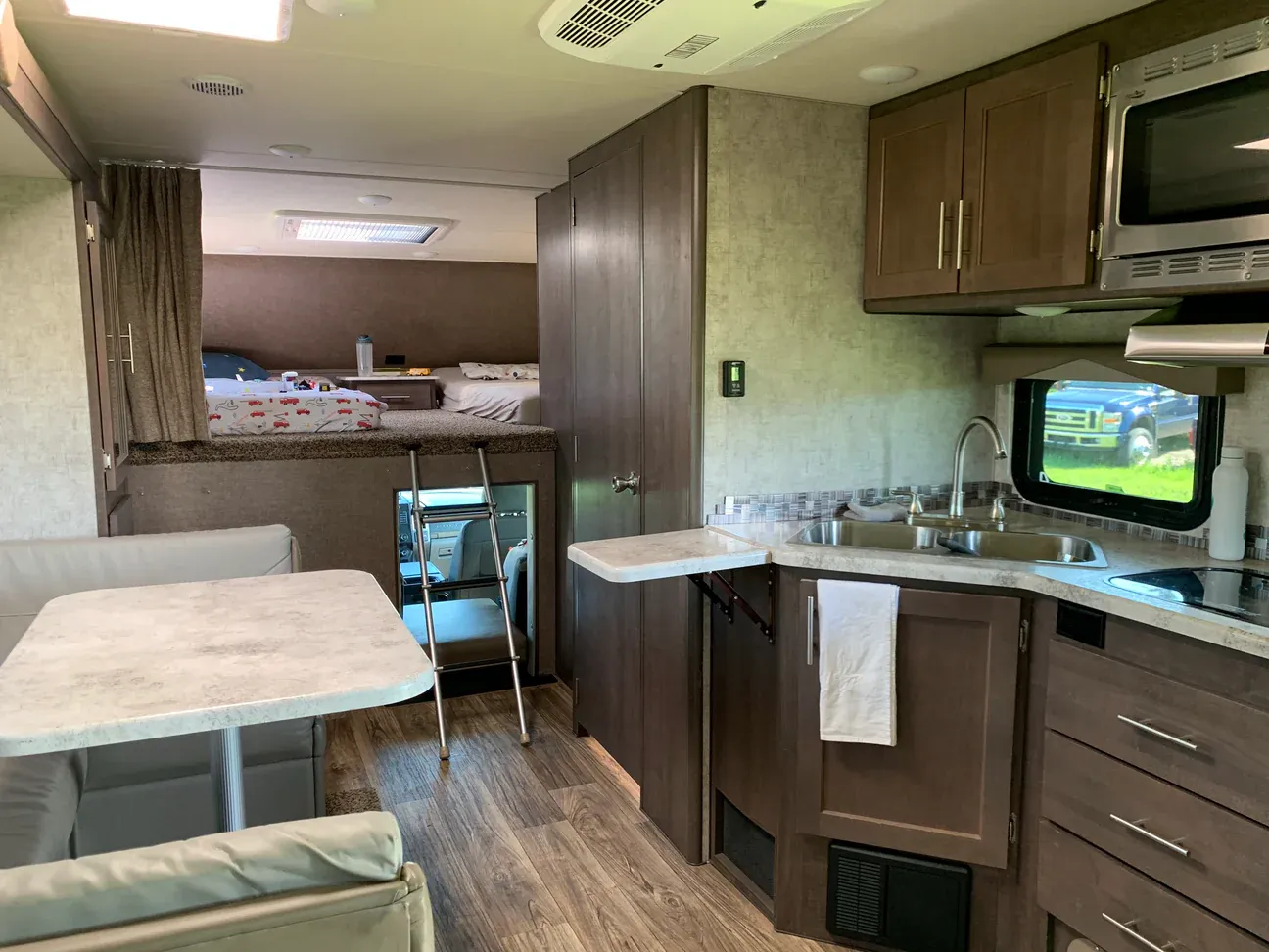 The kitchen and cab-over bedroom